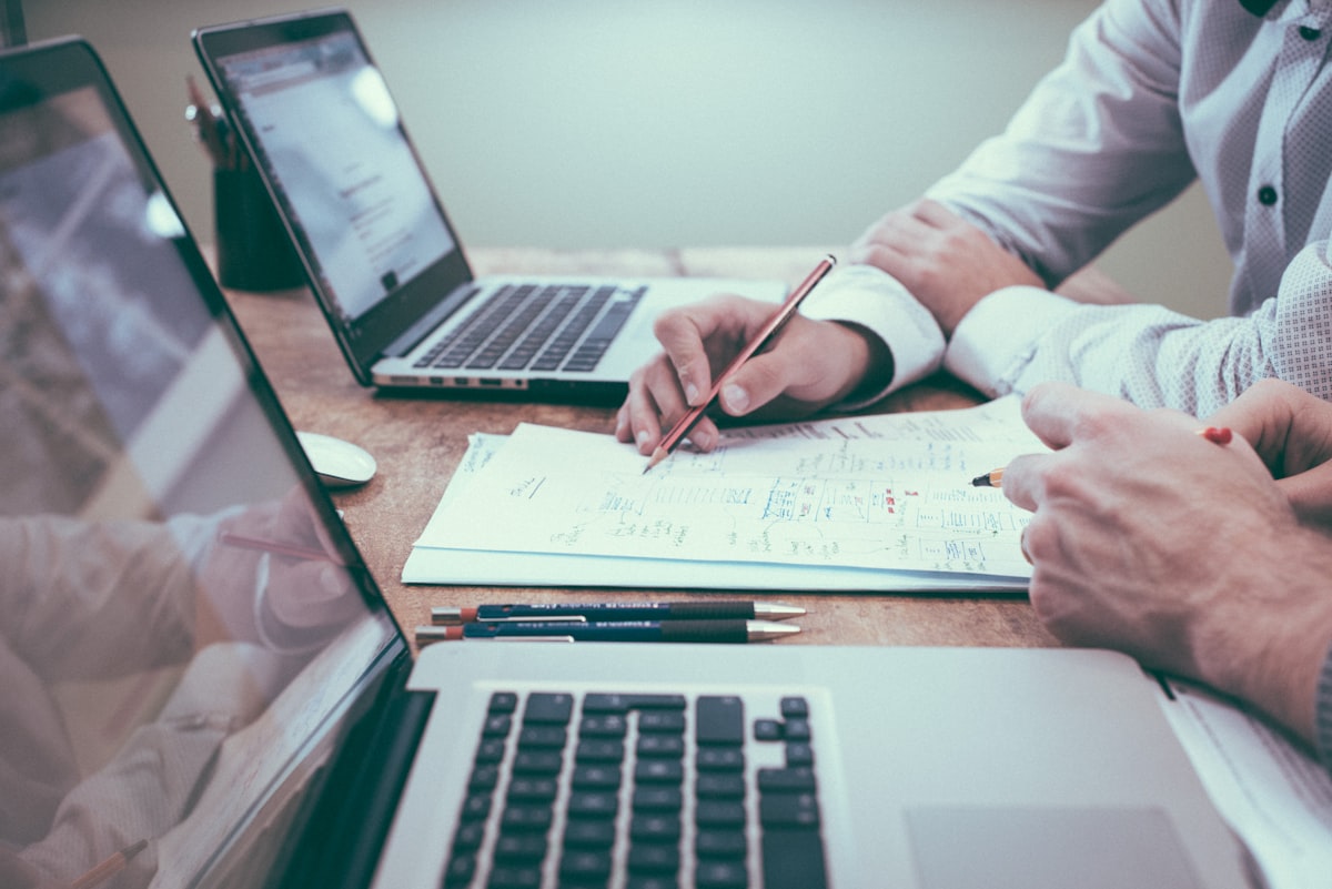 Independent insurance broker comparing health insurance options for self employed client